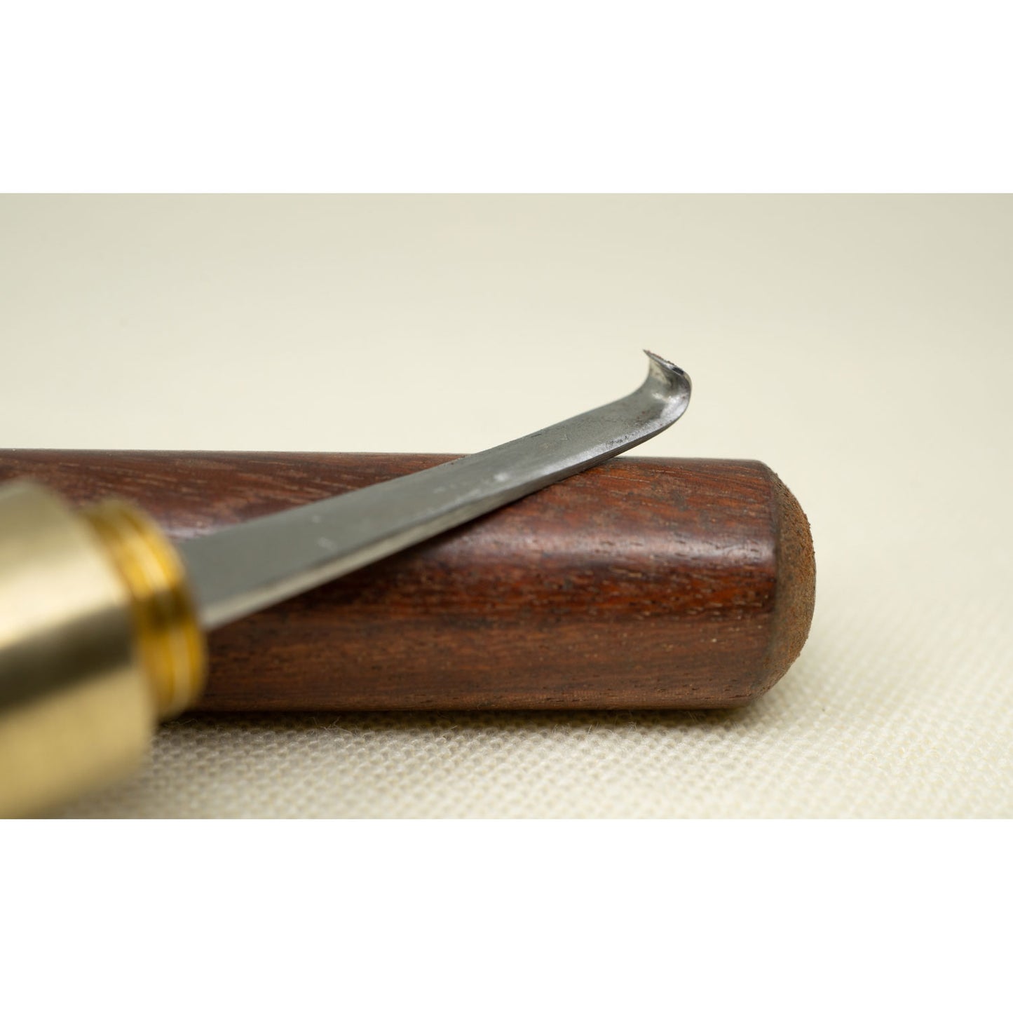 Shaving knife with wooden holder.